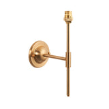 Endon Brackfield wall light in brushed aged brass with a round dome back plate, linear T-bar arm and B22 lampholder, shown on a plain white background.