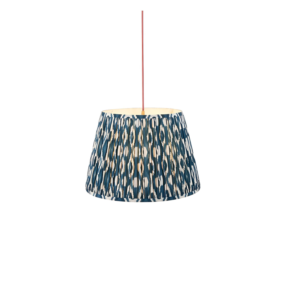 Endon Brackmont Ikat pendant light with a tapered pleated shade in marlin blue faux silk ikat print, suspended from a red fabric cable.