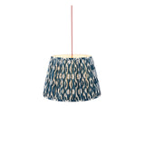 Endon Brackmont Ikat pendant light with a tapered pleated shade in marlin blue faux silk ikat print, suspended from a red fabric cable.