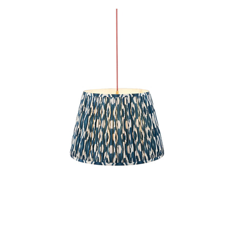 Endon Brackmont Ikat pendant light with a tapered pleated shade in marlin blue faux silk ikat print, suspended from a red fabric cable.
