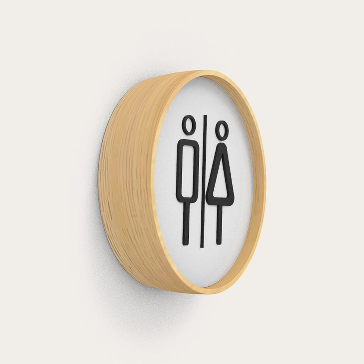 Bloom Signage Symbol lighting accessory in matt black iron, round wall light with wood-toned rim showing a cut-out male and female toilet symbol, white background.
