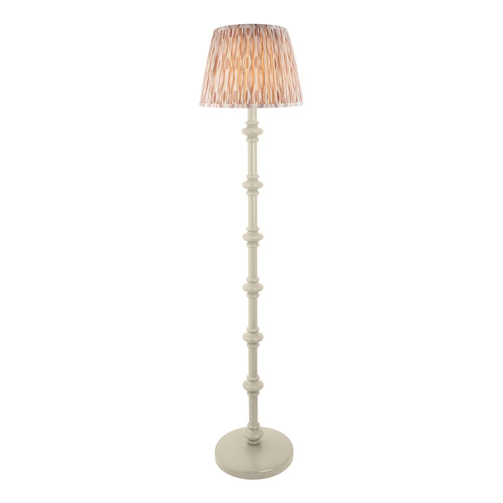 Bevbury Ikat Floor Lamp with turned wooden spindle base in white and a pleated Ikat fabric shade in grey and natural tones, shown on a plain background.