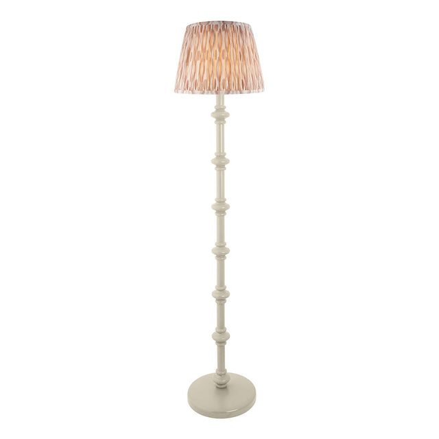 Bevbury Ikat Floor Lamp with turned wooden spindle base in white and a pleated Ikat fabric shade in grey and natural tones, shown on a plain background.