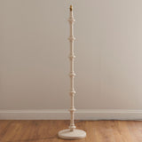 Bevbury Ikat Floor Lamp with white turned wooden spindle base and brass fitting, shown without shade against a plain neutral background.
