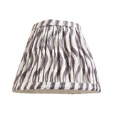 Endon Brackdale wall light shade in pleated pearl grey faux linen with a ripple print and taped edging, shown on a plain white background.