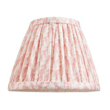 Cliffwood Leaf Wall Light shade in pink and white leaf-print fabric with pleated sides and taped trim, shown against a plain white background.