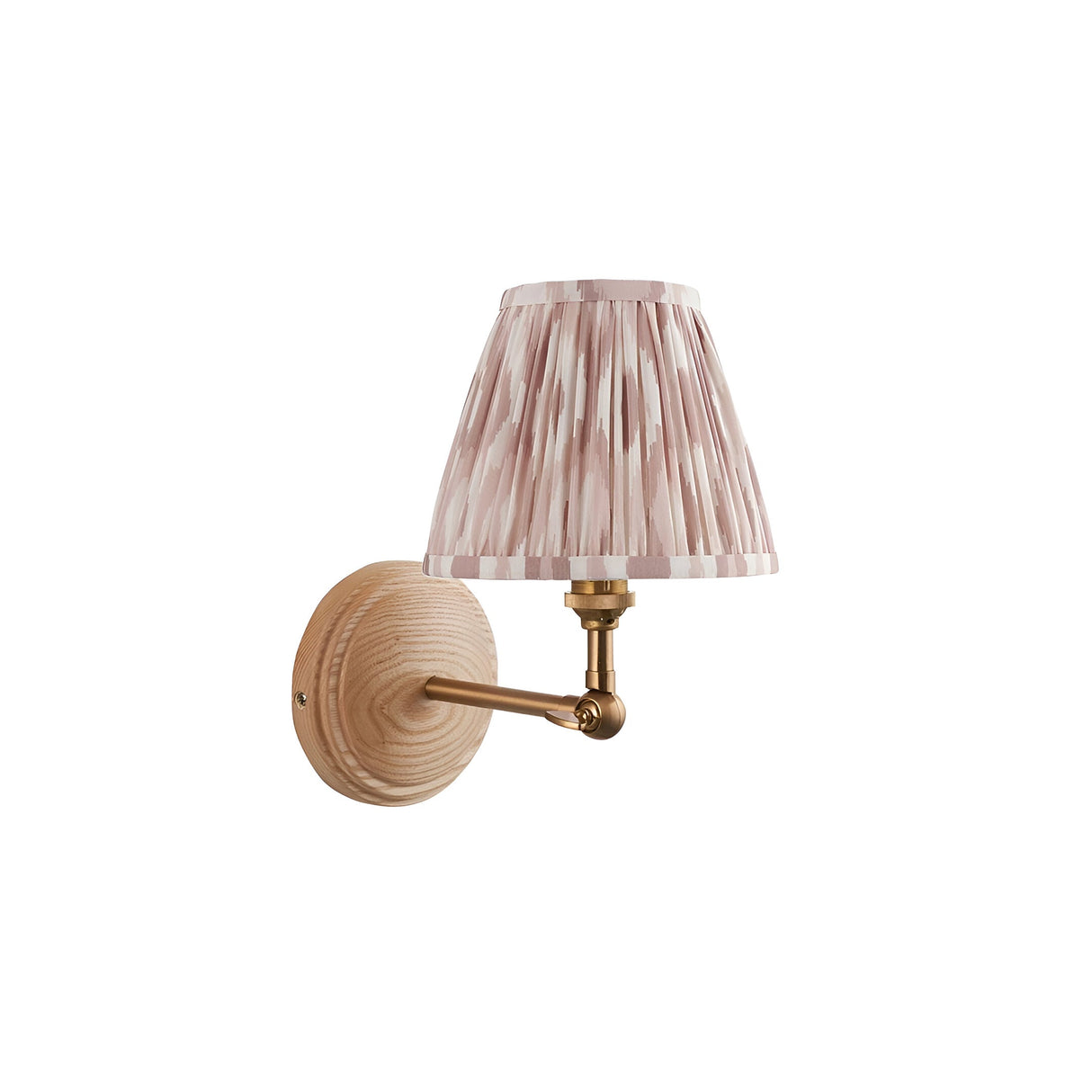 Endon Danemere wall light with natural ash wood back plate, brushed aged brass adjustable arm, and pleated pink Ikat tapered shade, on white.