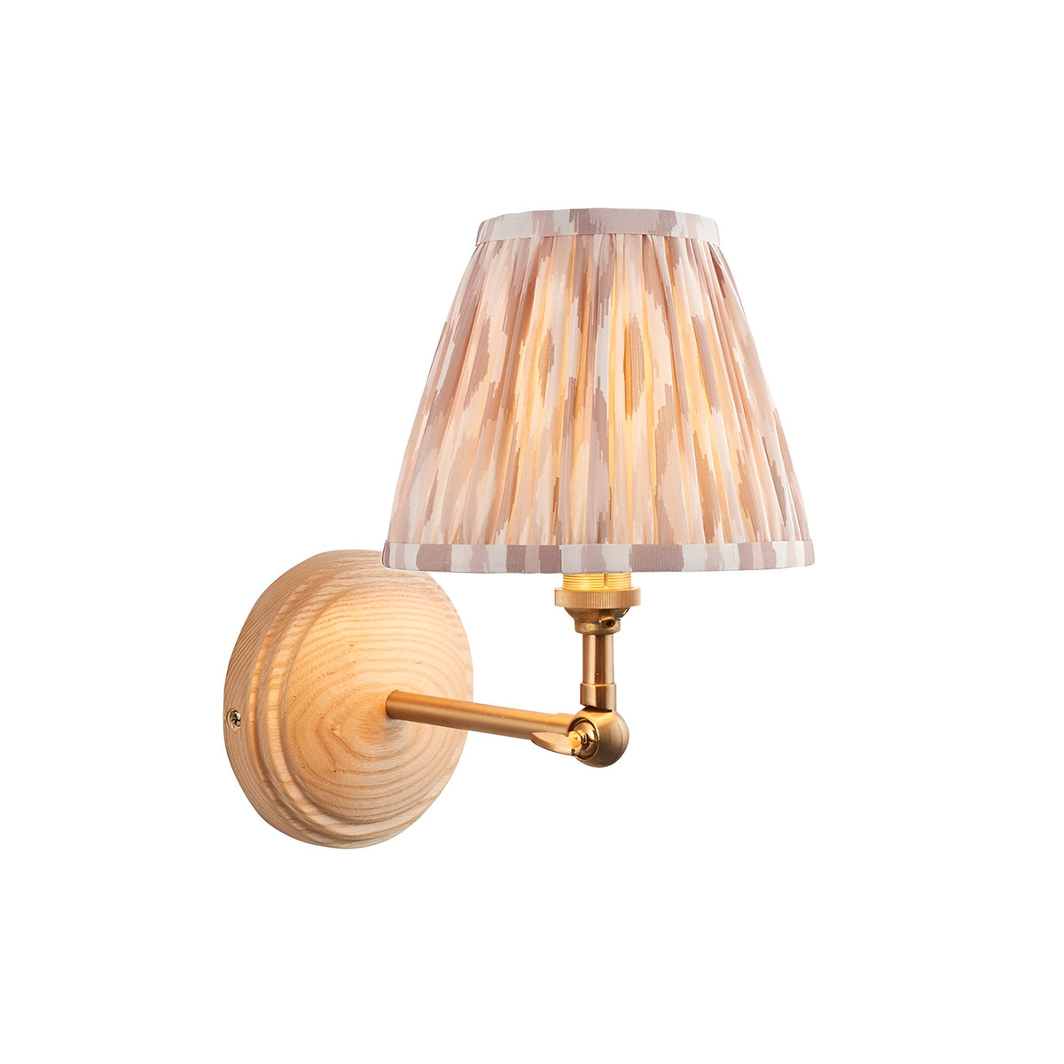 Endon Danemere Ikat wall light with ash wood back plate, brushed aged brass arm, and cream ikat-patterned pleated tapered shade on a white background.