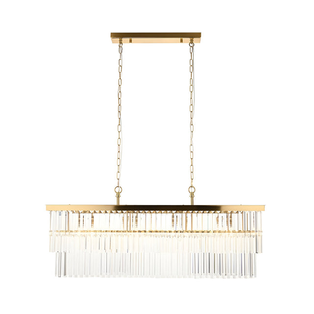 Bevstead 4-light linear pendant in brushed brass with clear glass lozenge drops, suspended from twin adjustable chains on a plain white background.