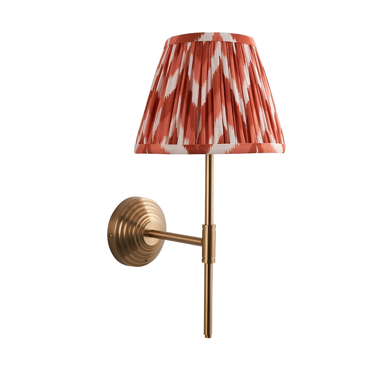 Endon Castleigh Zigzag wall light with brushed aged brass T-shaped arm and stepped back plate, topped with a red and white pleated tapered shade.