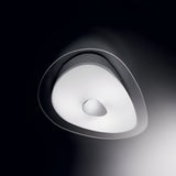 Introducing the Azure 4 Light Ceiling & Wall Light - White, a modern statement piece featuring an artistic design with asymmetric curves. Its smooth white surface, accentuated by a central circular element, creates a striking contrast against dark backgrounds, delivering sleek contemporary style and soothing ambient illumination.