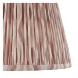 Close-up of the Endon Bevbury floor lamp's 35cm Ikat shade in pink clay, showing gathered pleat faux silk with a patterned brushstroke design.