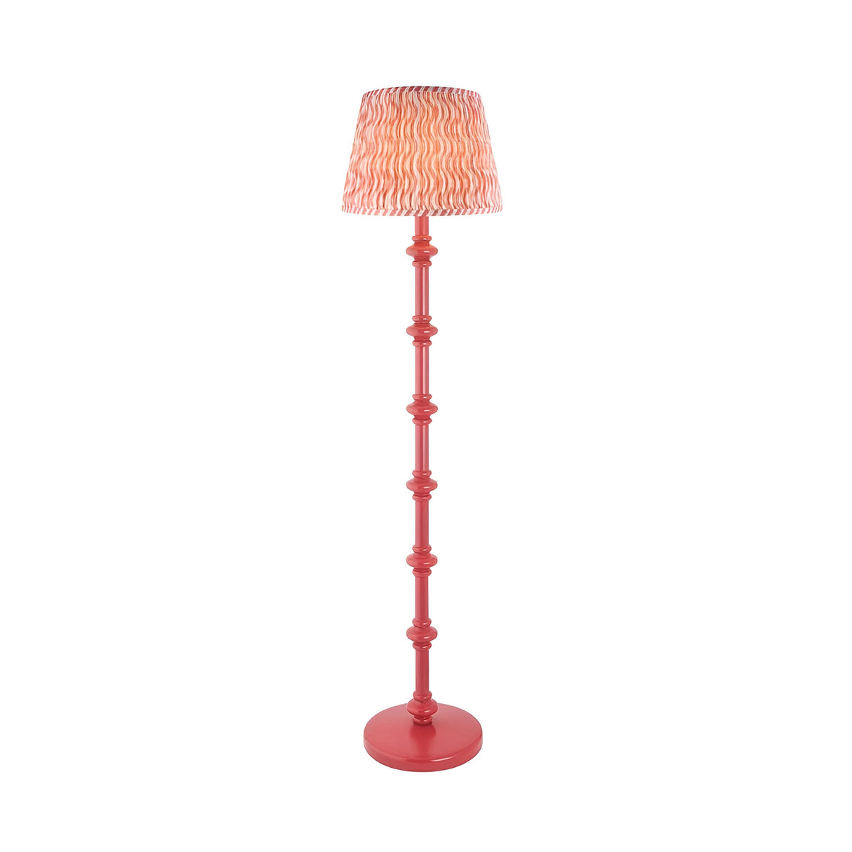 Endon Bevbury Ripple floor lamp with coral turned wooden spindle base and pink patterned faux linen tapered shade on a plain background.