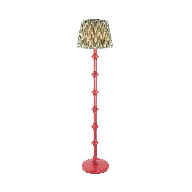 Endon Bevbury Zigzag floor lamp with a pink turned wood spindle base and green zigzag pleated faux silk shade, shown on a plain background.
