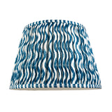 Endon Brenleigh Ripple 35cm gathered pleat lampshade in blue wave-pattern faux linen with taped edging, shown on a plain white background.