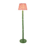Brenleigh Ikat Floor Lamp with green stacked sphere base and pink patterned Ikat fabric shade, shown on a plain white background.