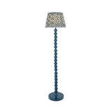 Endon Brenleigh floor lamp in blue with stacked sphere metal base and 35cm Ripple pleated faux linen shade in wavy blue pattern, on white.
