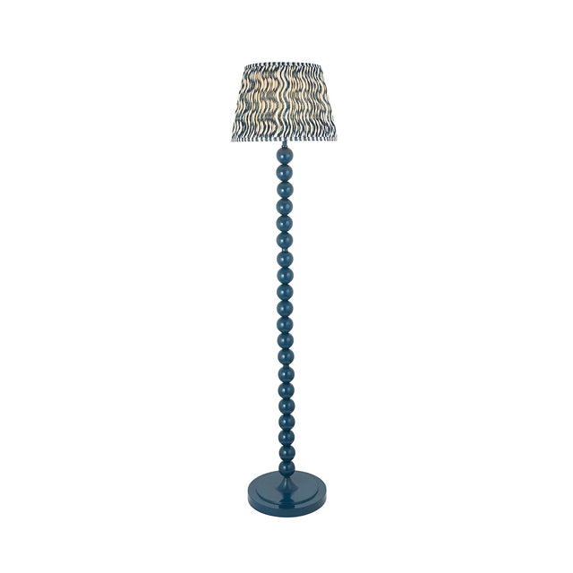 Endon Brenleigh floor lamp in blue with stacked sphere metal base and 35cm Ripple pleated faux linen shade in wavy blue pattern, on white.