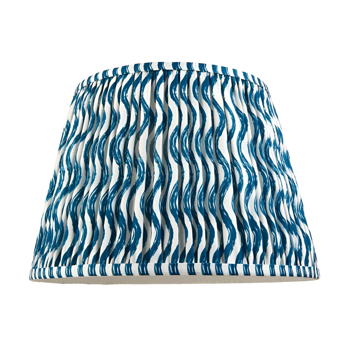 Endon Brenleigh Ripple 35cm tapered pleated lampshade in blue wavy print on white faux linen, shown on a plain background.