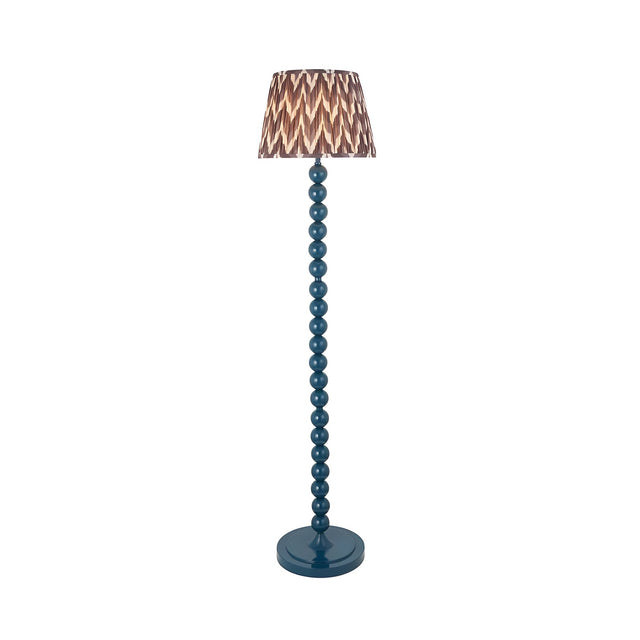 Brenleigh Zigzag Floor Lamp with blue stacked-sphere base and round pleated grey zigzag-pattern fabric shade, shown on a plain white background.