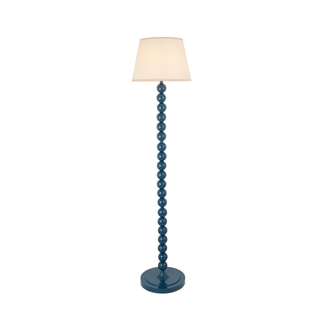 Brenleigh Ivy floor lamp with stacked sphere blue gloss base and tapered white fabric shade, on a plain white background.