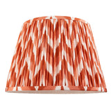 Endon Brenleigh 35cm Zigzag lampshade in orange and white pleated faux silk with a tapered drum shape, shown on a plain white background.