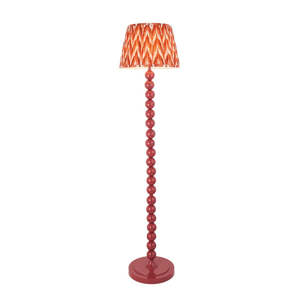 Brenleigh Zigzag Floor Lamp in pink, featuring a stacked sphere metal base and a pleated zigzag-pattern fabric shade, shown on a plain white background.