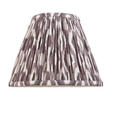 Endon Carlworth tapered pleated table lamp shade in almond and grey Ikat faux silk with taped edging, shown on a plain white background.