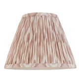 Carlworth Ikat Table Lamp II with pleated Ikat-patterned fabric shade in almond and neutral tones, shown on a plain white background.