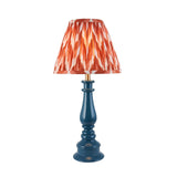 Endon Carlworth table lamp with marlin blue turned resin spindle base and pleated apricot zigzag fabric shade, on a plain white background.