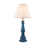 Endon Carlworth Ivy table lamp with turned marlin blue high gloss resin spindle base, brass lamp holder and tapered vintage white fabric shade.