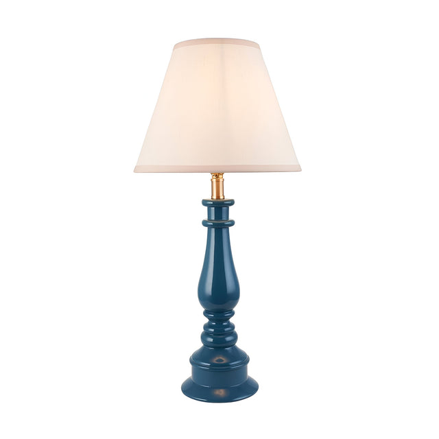 Endon Carlworth Ivy table lamp with turned marlin blue high gloss resin spindle base, brass lamp holder and tapered vintage white fabric shade.