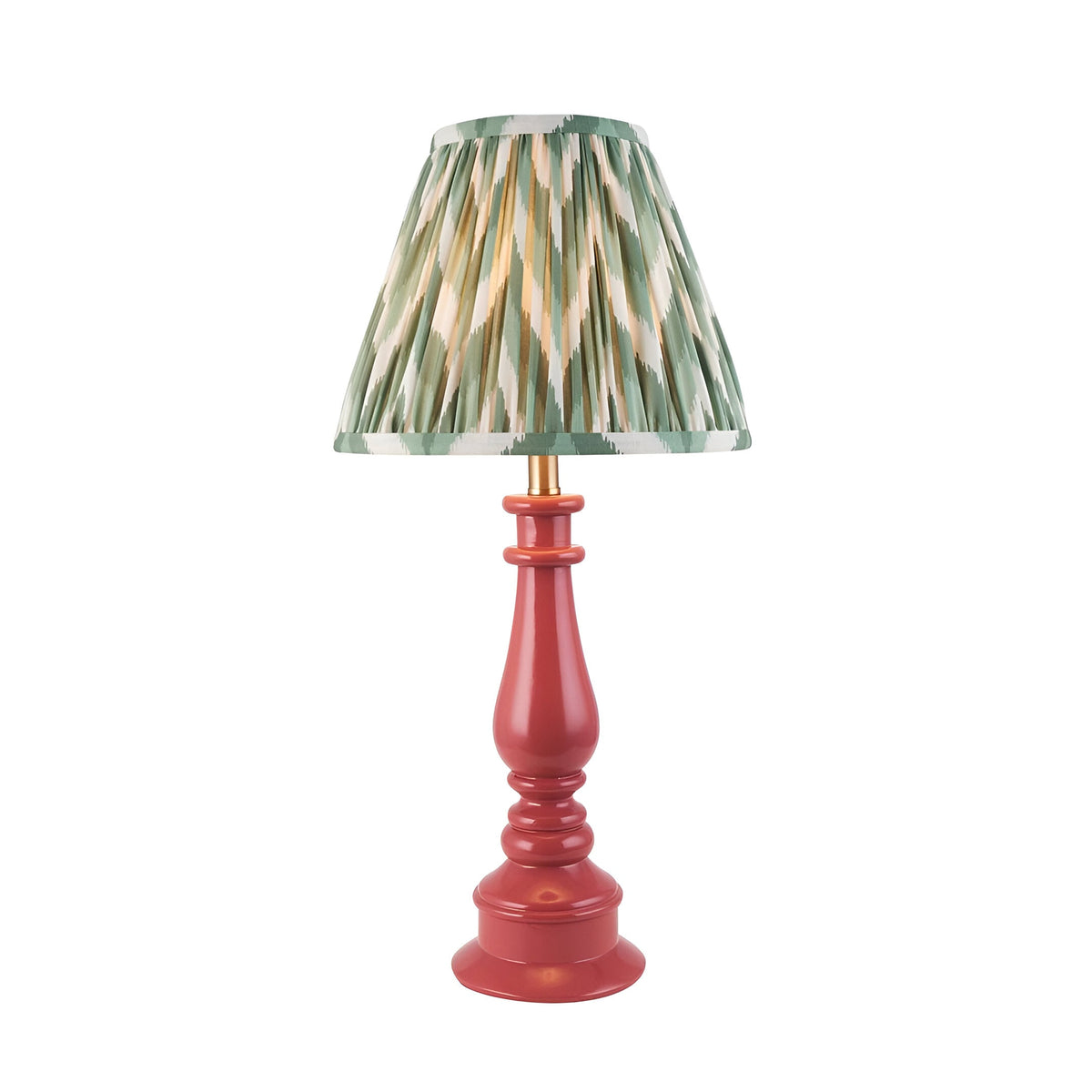 Carlworth Zigzag Table Lamp with a pink clay resin spindle base and a pleated green zigzag-print fabric shade, shown on a plain white background.