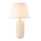 Endon Amberley Ivy table lamp with a white crackle-glazed ceramic bobble base, brass stem and tapered ivory fabric shade on a plain background.