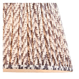 Close-up of the Ashbury Leaf table lamp's pleated fabric shade in cream and grey leaf-print pattern, showing gathered folds and trimmed edge.