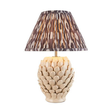 Endon Caldford ceramic table lamp with ivory crackle glaze leaf-detailed base and pleated grey Ikat print shade on a plain white background.