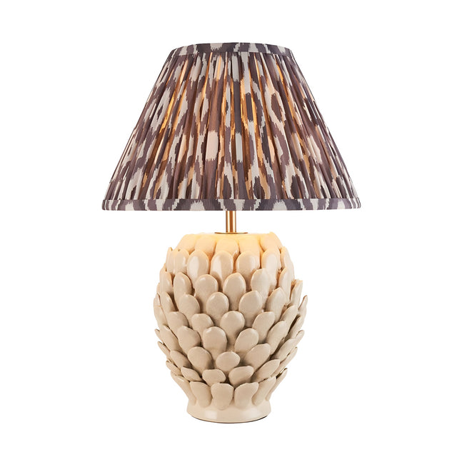 Endon Caldford ceramic table lamp with ivory crackle glaze leaf-detailed base and pleated grey Ikat print shade on a plain white background.