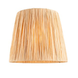 Endon Caldford tapered table lamp shade hand-wrapped in natural beige raffia, shown illuminated against a plain white background.