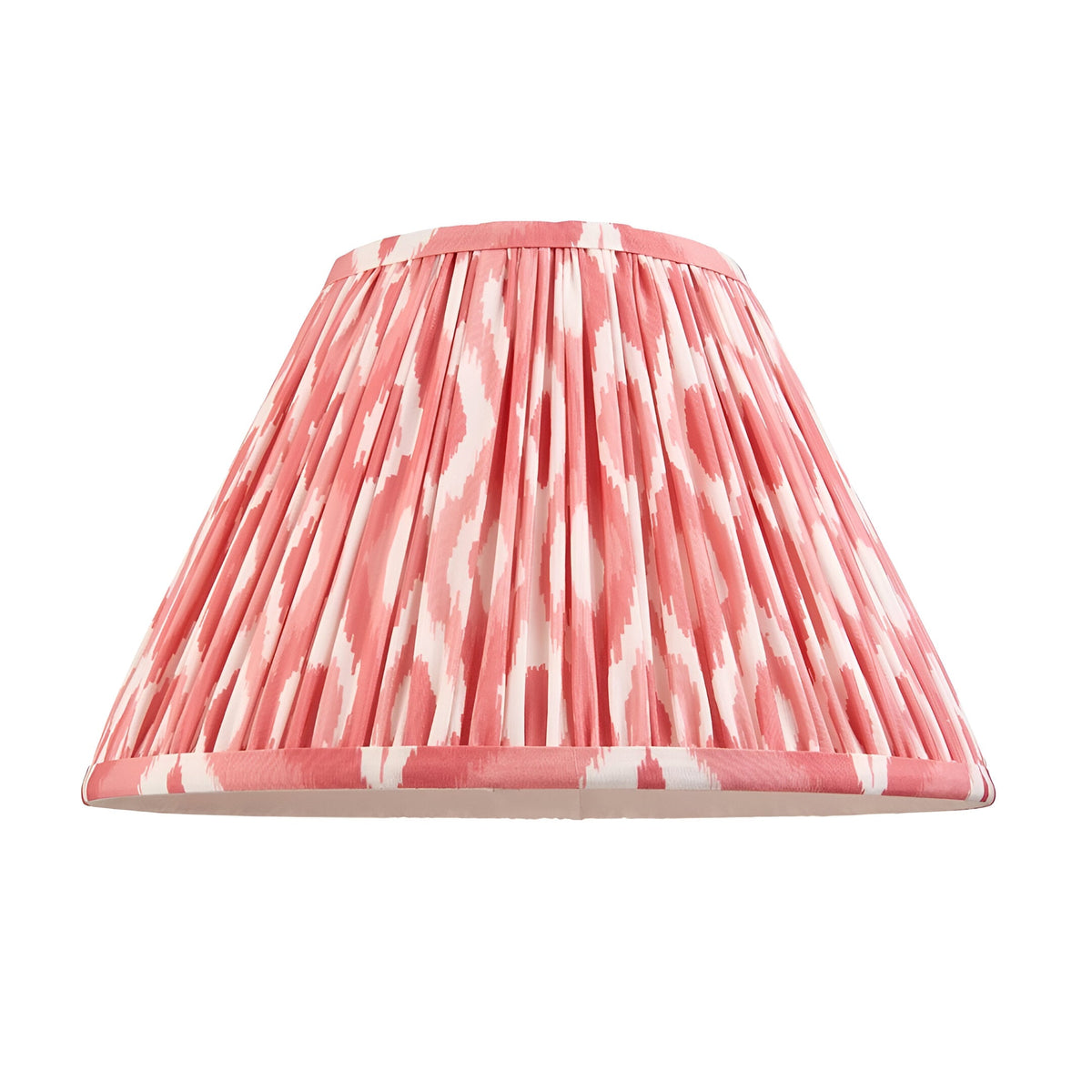 Empire lamp shade in pleated pink and white Ikat-print fabric with contrast trim, shown alone on a white background.