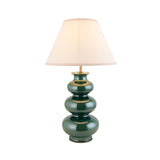 Carlstead Ivy Table Lamp in glossy green ceramic with tiered gourd-shaped base, brass fittings, and an ivory cotton-mix Ivy shade, shown on a white background.