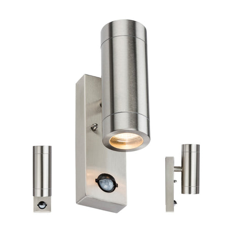 The Stainless Steel Up/Down Wall Light With PIR boasts a sleek cylindrical design in stainless steel, featuring a PIR motion sensor at its base. It displays from three angles and emits a warm glow from the front.