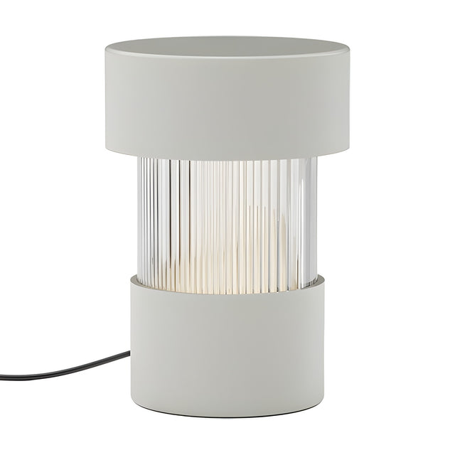 Balise Cylinder Ribbed Glass Lantern Table Lamp in matt white, with iron cap and base framing a fluted glass centre band, shown on a plain white background.