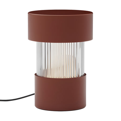 Balise Cylinder Ribbed Glass Lantern table lamp in terracotta, with a fluted glass centre between two iron bands, shown on a plain white background.