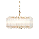 Endon Danebury 5 light pendant in aged brass with a wide drum frame of clear cut crystal rods, suspended from a chain on a plain background.
