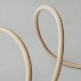 Close-up of the Endon Brackmont Flex Set in natural braided fabric cable, looped to show its woven texture against a light grey background.