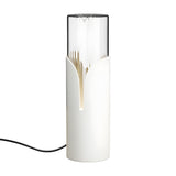 Bisel Cylinder Ribbed Glass Table Lamp in matt white iron with a tapering petal-cut sleeve, fluted clear glass top, and lit base seam, shown on a plain white background.