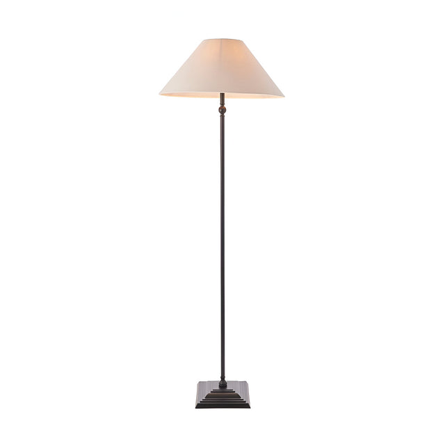 Endon Caldmere floor lamp with a tapered natural linen shade on a slim matt black metal stem and stepped square base, shown on a white background.