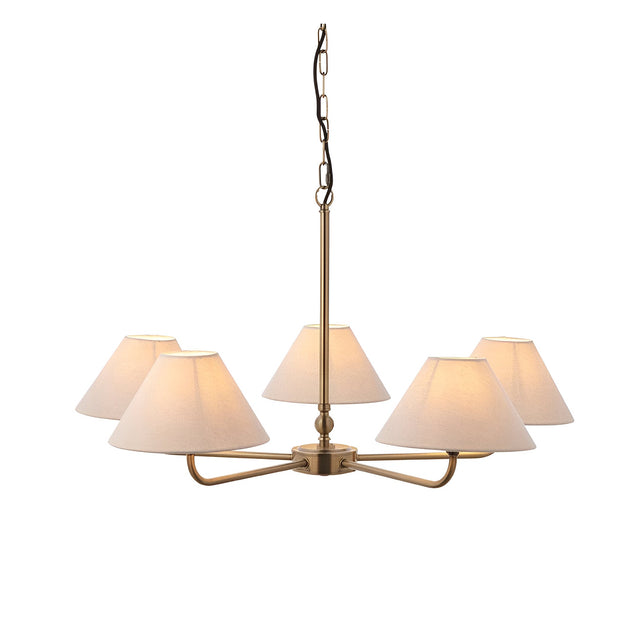 Caldmere five-light large pendant with tapered natural linen shades on a brass metal frame and chain suspension, shown on a plain white background.