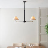 Endon Caldmere 2 Light Pendant in black with tapered natural linen shades on a linear bar and telescopic stem, hung above a dining table setting.
