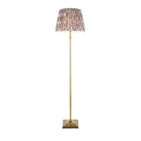 Caldmere Ikat Floor Lamp in Grey with antique brass stem, square base, and pleated grey Ikat-pattern fabric shade on a white background.